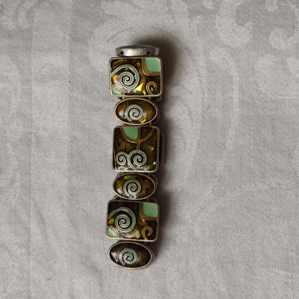 Silver metal and green enamel bracelet